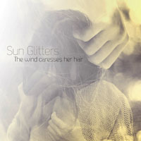 Sun Glitters - The Wind Caresses Her Hair